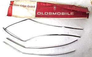 NOS GM 982830 1967 Oldsmobile Delta 88 4-door sedan door edge guard moldings - Picture 1 of 4