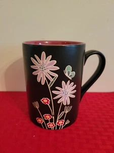 Tazza Tag 5" nera con margherite e farfalla usata in ottime condizioni - Foto 1 di 4