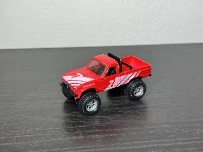 Vendedor dos EUA Tomica Tomy No. 61 picape Toyota Hilux Bigfoot 4wd 4x4 - Imagem 1 de 4