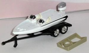 1/64 = JAMES BOND = 007 / BOAT & TRAILER - PLUS STAND / Tandem Rubber Tires - Picture 1 of 6