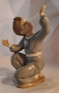 #595 - Retired Lladro, Nao "Jet Pilot"#1133 Boy w/missing plane - Picture 1 of 5