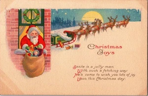 Postal de Navidad de colección de 1922 Papá Noel con juguetes trineo de renos - Imagen 1 de 2