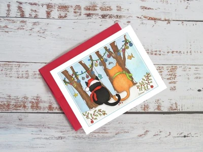 Winter Meowy Christmas black cat and ginger cat, outdoor woods,  notecard #481 - Image 1 of 3