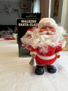 Juguete musical vintage de Papá Noel B/O para caminar reproduce 3 canciones caja original años 70 - Imagen 1 de 15