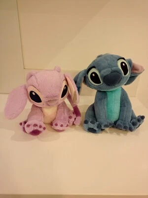 LOT DE 2 PELUCHES STITCH ET ANGEL  26 ET 30 CM PARC DISNEY - Photo 1/4