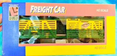 Life-Like Trains - HO Scale NORTH WESTERN Freight 8488 Stock Car Green Yellow - Image 1 of 3