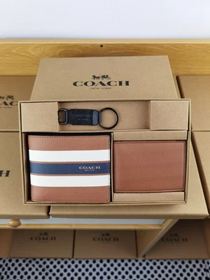 JUEGO DE REGALO CARTERA 3 EN 1 PARA HOMBRE EN CAJA EN LONA DE FIRMA Marrón Foto 1 de 4