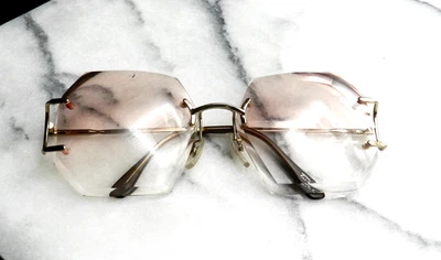 Винтажные солнцезащитные очки TURA 178 135 5 1/4 золотистые без оправы 7 сторон мод только Япония - Изображение 1 из 4