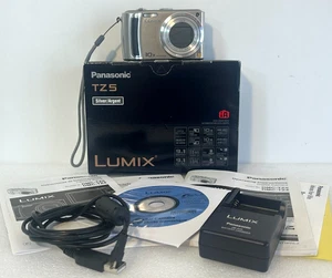 Panasonic Lumix DMC-TZ5 9,1 megapixel argento zoom 10x con scatola, caricatore, manuali e SD 4 GB - Foto 1 di 9