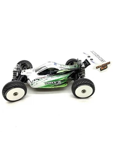 Mugen Seiki MBX7 Eco Scala 1/8 4WD Nitro Buggy Roller NUOVO MAI USATO - Foto 1 di 12