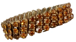 Brazalete flexible ámbar estrás banda de metal dorado años 50 vintage - Imagen 1 de 7