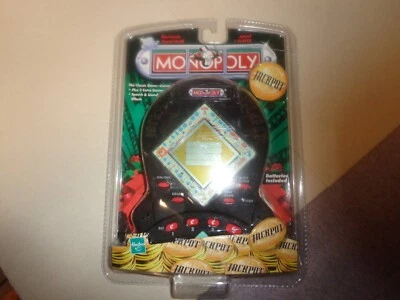 1999 HASBRO MONOPOLY POCKET HANDHELD GAME IN WORKING ORDER WITH ORIG PACKAGE - Image 1 of 3