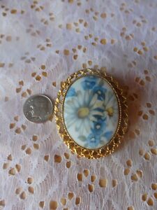 Vintage Porcelain Blue Flowered Brooch marked but tough to make out gold trimmed