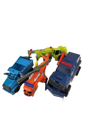 Lote de 4 camiones de volteo/carretilla elevadora Matchbox Power Shift y helicóptero y camión de volteo de acción Foto 1 de 4