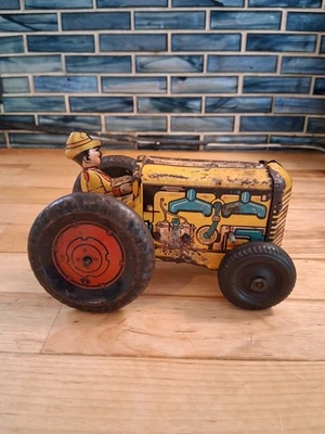 2289 - ¡Tractor de metal de cuerda de juguetes Marx vintage de los años 50 con conductor! ¡Grandes gráficos! Foto 1 de 4