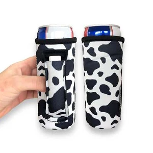 Manipulador de latas delgado con estampado de vaca blanco y negro 12 oz™ - Imagen 1 de 1