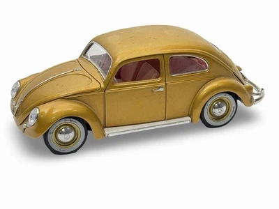 Volkswagen Beetle 1955 edición dorada Bburago 1:18 hecho en Italia Foto 1 de 4