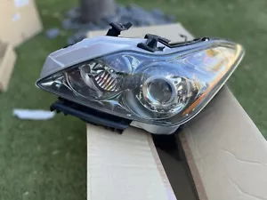 Faro izquierdo conductor OEM INFINITI 26060-1NL0B 260601NL0B G35 CUPÉ - Imagen 1 de 13