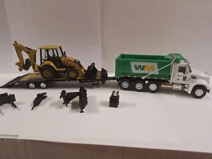 1/64 2020 Mack Granite Tri-Axle Dump Truck and Cat 420 XE Backhoe Loader - Picture 1 of 4