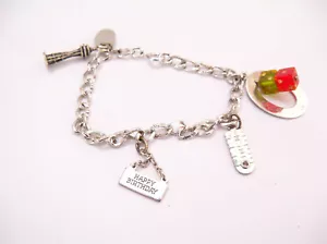 Vintage Sterling Silver Charm Bracelet. 4 charms marked Crea Ster - Picture 1 of 11