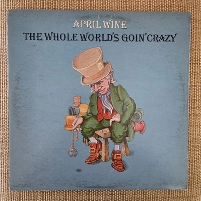 April Wine - The Whole World's Goin Crazy (LP, 1976 Aquarius, Canada, AQR 510) - Image 1 of 4