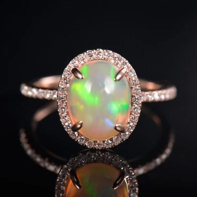 Anillo clásico con halo de ópalo ovalado de diamantes naturales de oro rosa de 14 quilates regalo de cumpleaños Foto 1 de 4