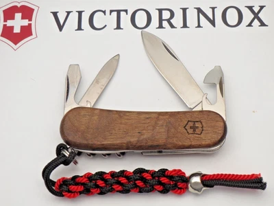 Victorinox Swiss Army EVOLUTION 10 口袋刀 - 漂亮的胡桃木手柄完好 — 第 1/4 张图片