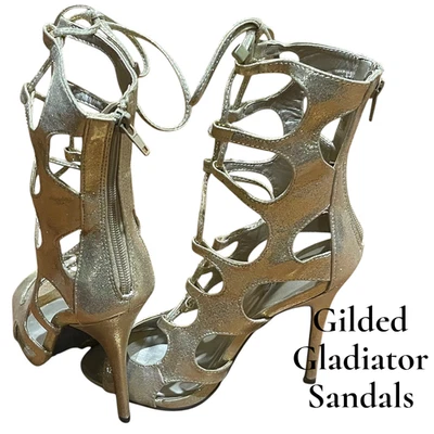 Sandalias de aguja doradas con cordones diosa gladiador - recorte metálico • tacón llamativo Foto 1 de 4