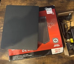 Toshiba 3.5" desktop external hard drive with 2TB storage capacity - Photo 1/6