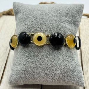 Elegantes handverschmolzenes schwarzes und gelbes Glas Kettenglied Armband - Bild 1 von 5