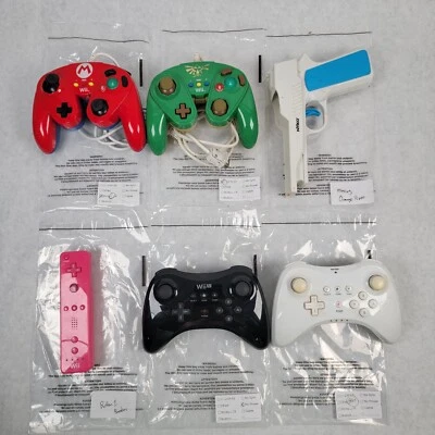 Wii U Pro/3rd-Party, Mario/Legend of Zelda FightPad, Pink Wiimote, Nyko Blaster - Image 1 of 4