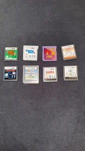 8x Nintendo (3)DS Module - Animal Crossing, Sims 3, New Super Mario Bros, R4 new - Bild 1 von 2