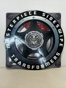 Transformers Sideswipe MP12 Bonus Silbermünze Sammlerstück Zubehör Brandneu - Bild 1 von 3