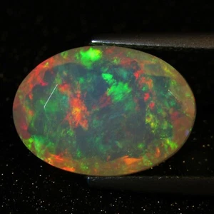 4.31Cts Natural Color Play Unheated Ethiopia White Opal Oval Cut Gemstone - Picture 1 of 5