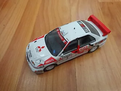 IXO 1/43 Mitsubishi Lancer Evo III 1000 Laghi Rally 1986 Makinen / Harjanne Auto - Immagine 1 di 2