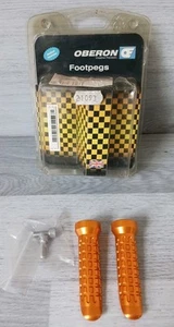 Clavijas reposapiés de moto Orberon naranja aluminio anodizado precisión creativa - Imagen 1 de 11