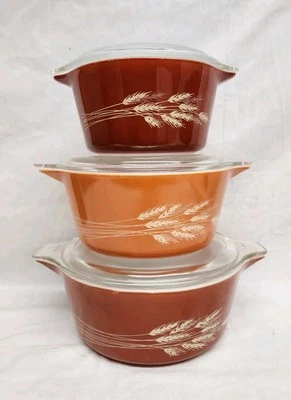 Vintage Pyrex Autumn Harvest Wheat Pattern Orange/Rust 3 Piece Set With Lids  - Image 1 of 4