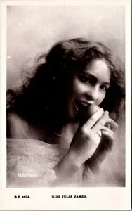 JULIA JAMES : BEAUTIFUL STAGE ACTRESS : EATING AN APPLE : RPPC  ( - Picture 1 of 3