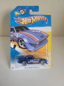 2012 Hot Wheels Mazda RX 7 New Models #31 BENT CARD CORNERS - Picture 1 of 6