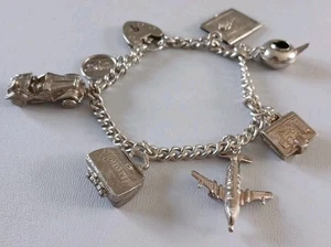 Vintage Charm Bracelet Sterling Silver Curb Chain With Lock & Chain And 7 Charms - Picture 1 of 12