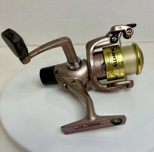 Shakespeare Mantis Fishing Reel MN030RT. Rose Colored. - Picture 1 of 9