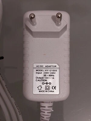Power Netzteil AC/DC Model: HY121000  12V/ 1A gebraucht - Bild 1 von 4