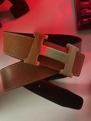 HERMÉS - Cinturón con hebilla de oro amarillo con correa de cuero. HOMBRE MEDIANO/GRANDE Foto 1 de 4