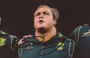 SUDÁFRICA RUGBY: FOTO DE ACCIÓN FIRMADA POR COENIE OOSTHUIZEN 6x4 + certificado de autenticidad *springboks* - Imagen 1 de 1