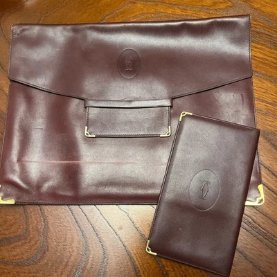 Juego de billetera larga bolso clutch de cuero borgoña Charvet Foto 1 de 4