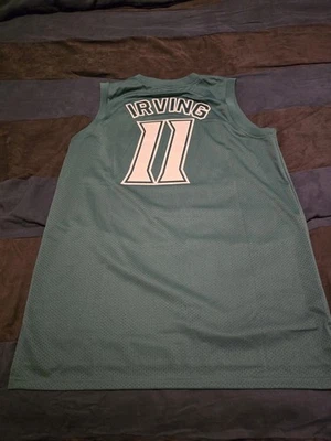 $135...Headgear Classics Kyrie Irving size XL St Patrick Highlights Jersey. - Image 1 of 4