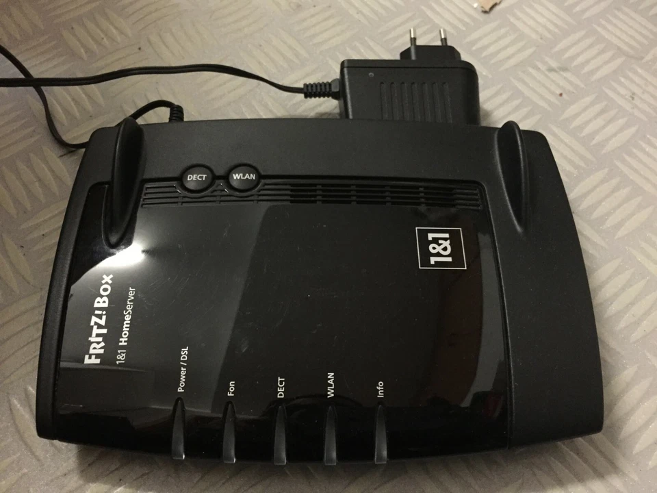 AVM FritzBox 7330 SL (schwarz), DSL-Modem / WLAN-Router - Home Server + Netzteil - Bild 1 von 3