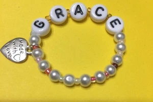 New  Doll bracelet  "Grace " 3.5" Elastic Pearl Bracelet With 1 /charm - Picture 1 of 6