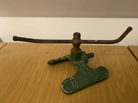 AN ANTIQUE CAST ALLOY AND BRASS GARDEN LAWN SPRINKLER Cover