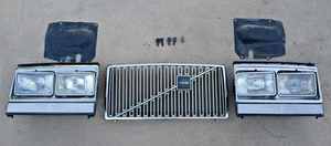 Volvo 240 242 244 245 OEM Quad Square Headlamp Headlights + Reflectors + Grill - Picture 1 of 24